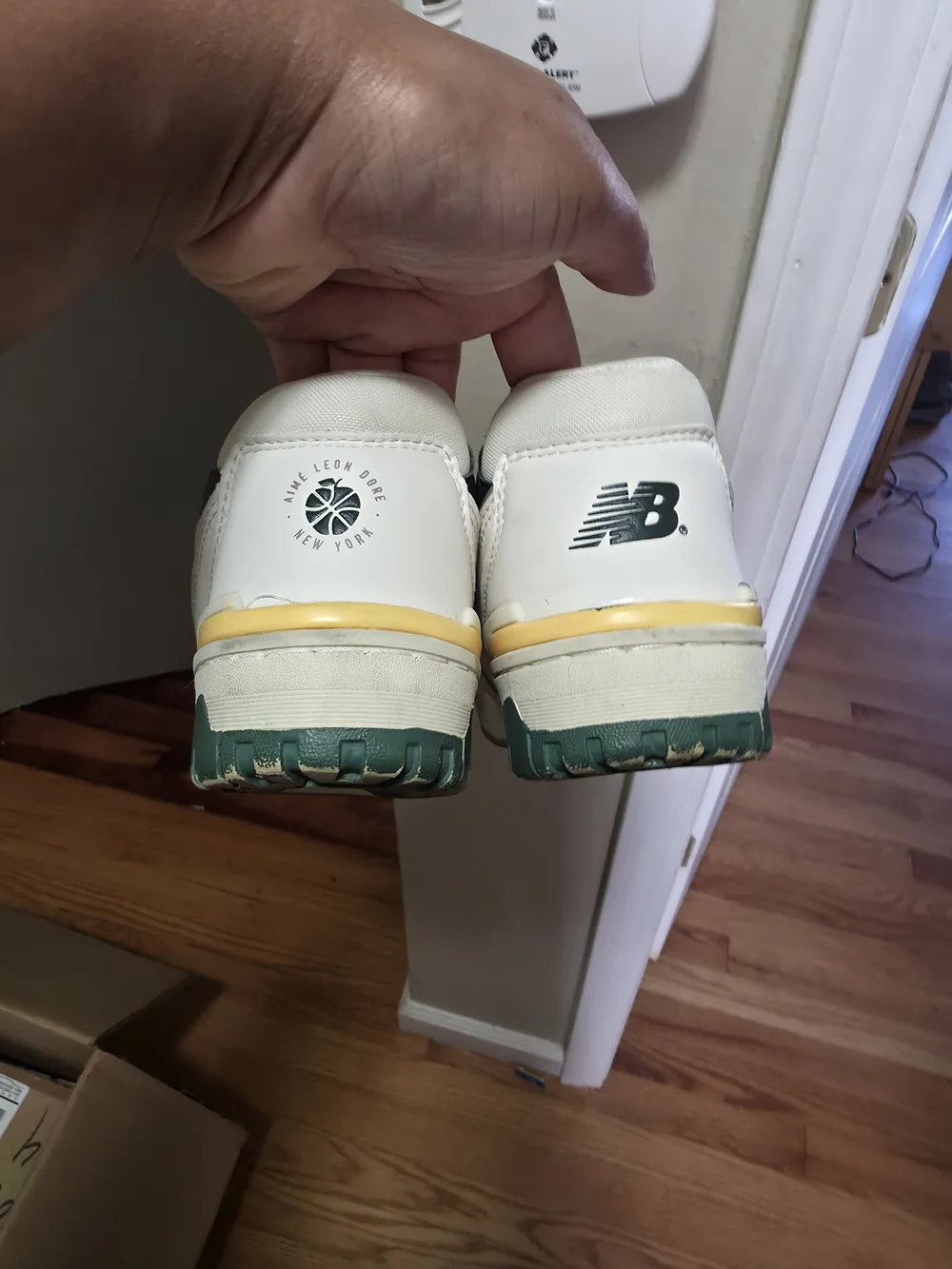 New Balance Kids 550 Sneaker in Cream with Green and Yellow Accents